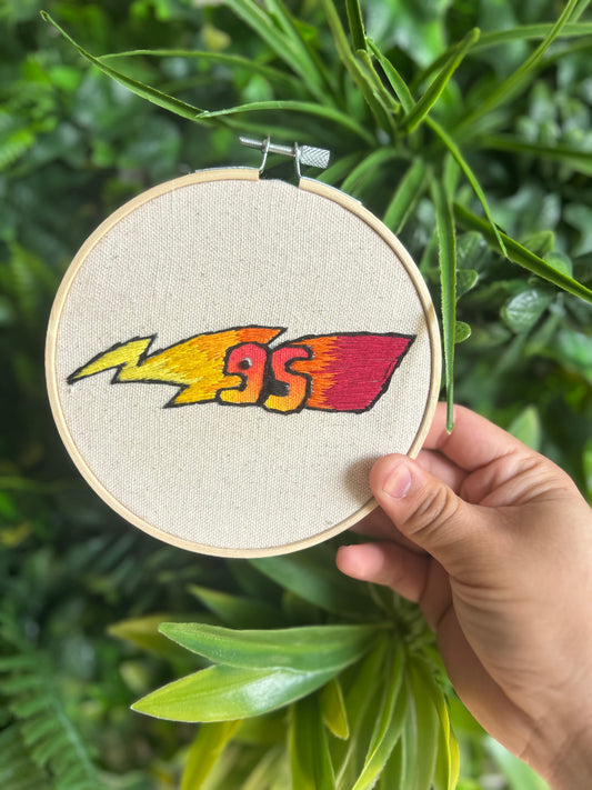 Racing Meets Thread & Needle! 🏁🧵